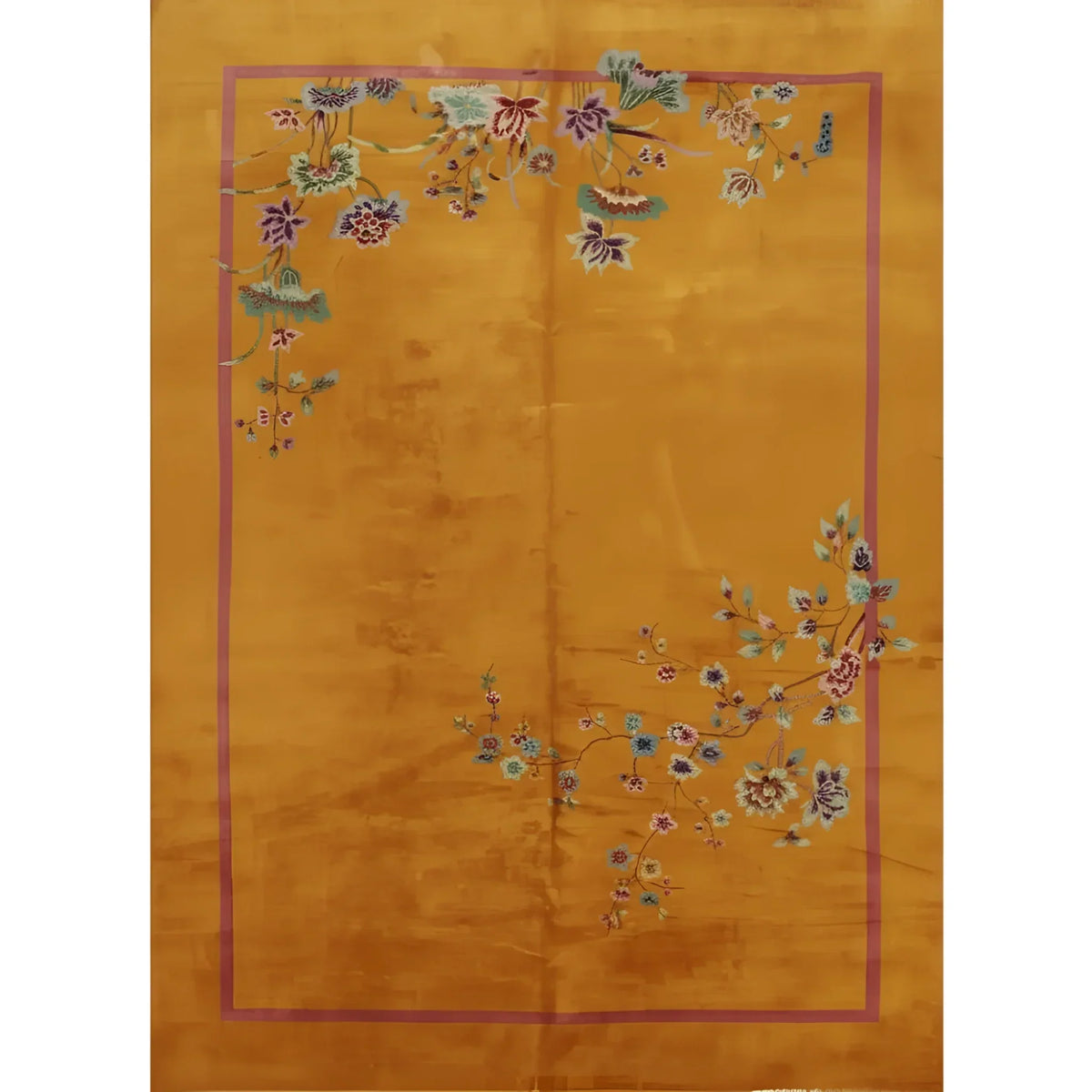 Spring Floral hand-knotted wool rug with a golden ground, pink border, and floral branches in the corners