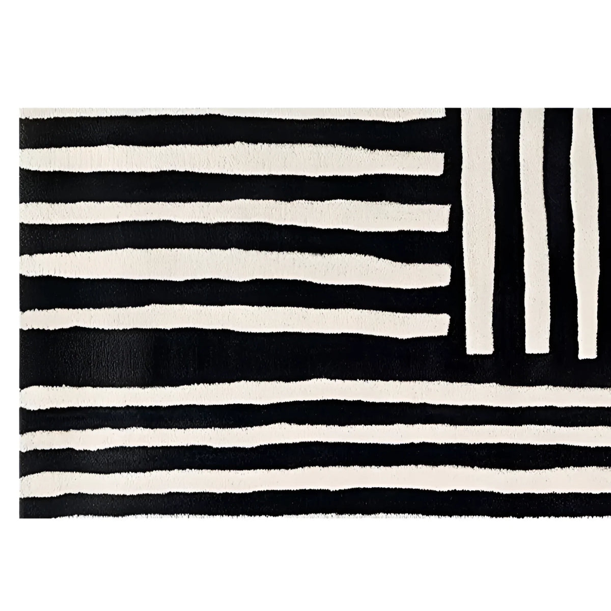 A contemporary wool runner rug featuring bold black and white stripes in an abstract pattern. Perfect for adding a modern touch to kitchens, hallways, or bathrooms, this hand-tufted rug combines style and functionality.