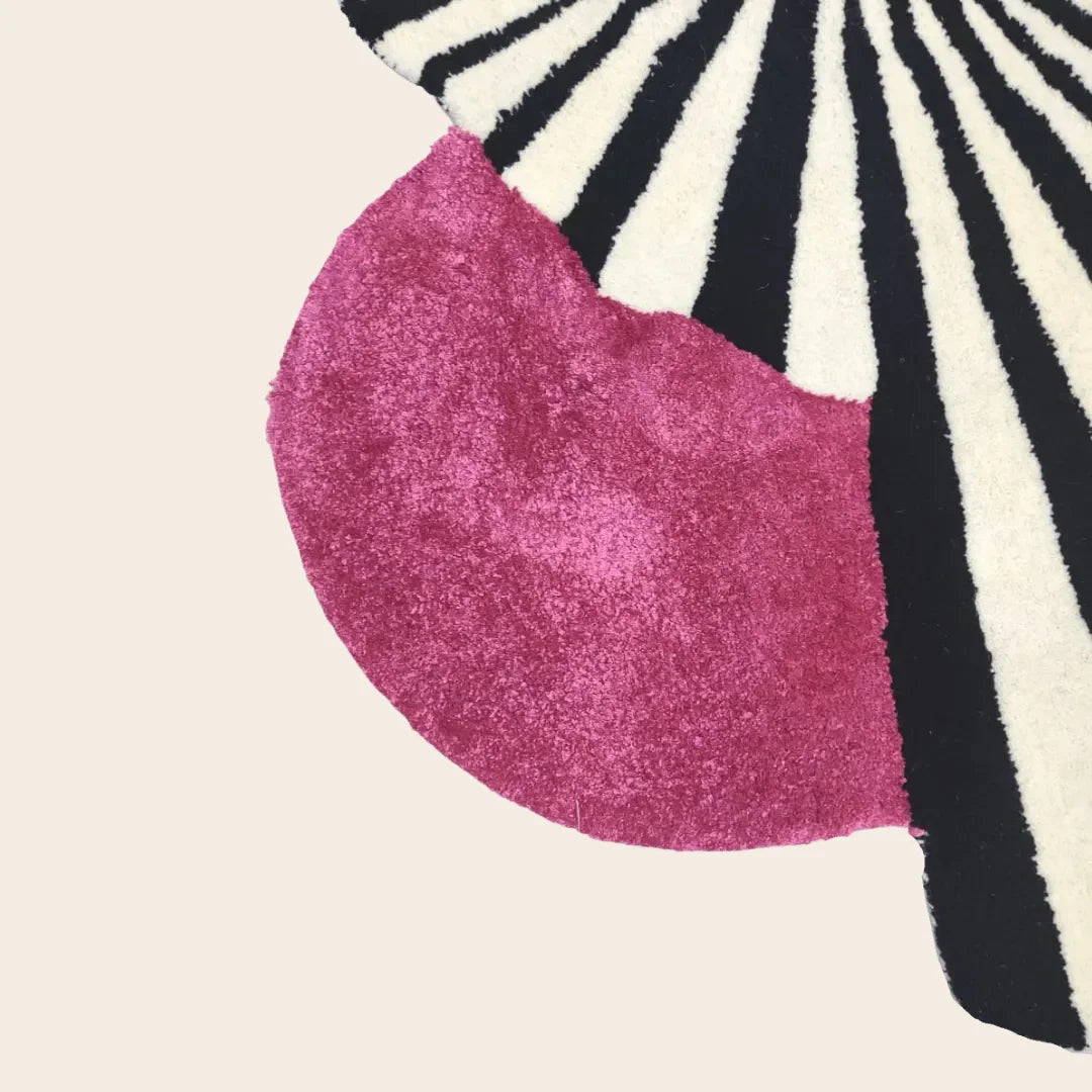 Step onto the Pink Sun Hand Tufted Wool Rug