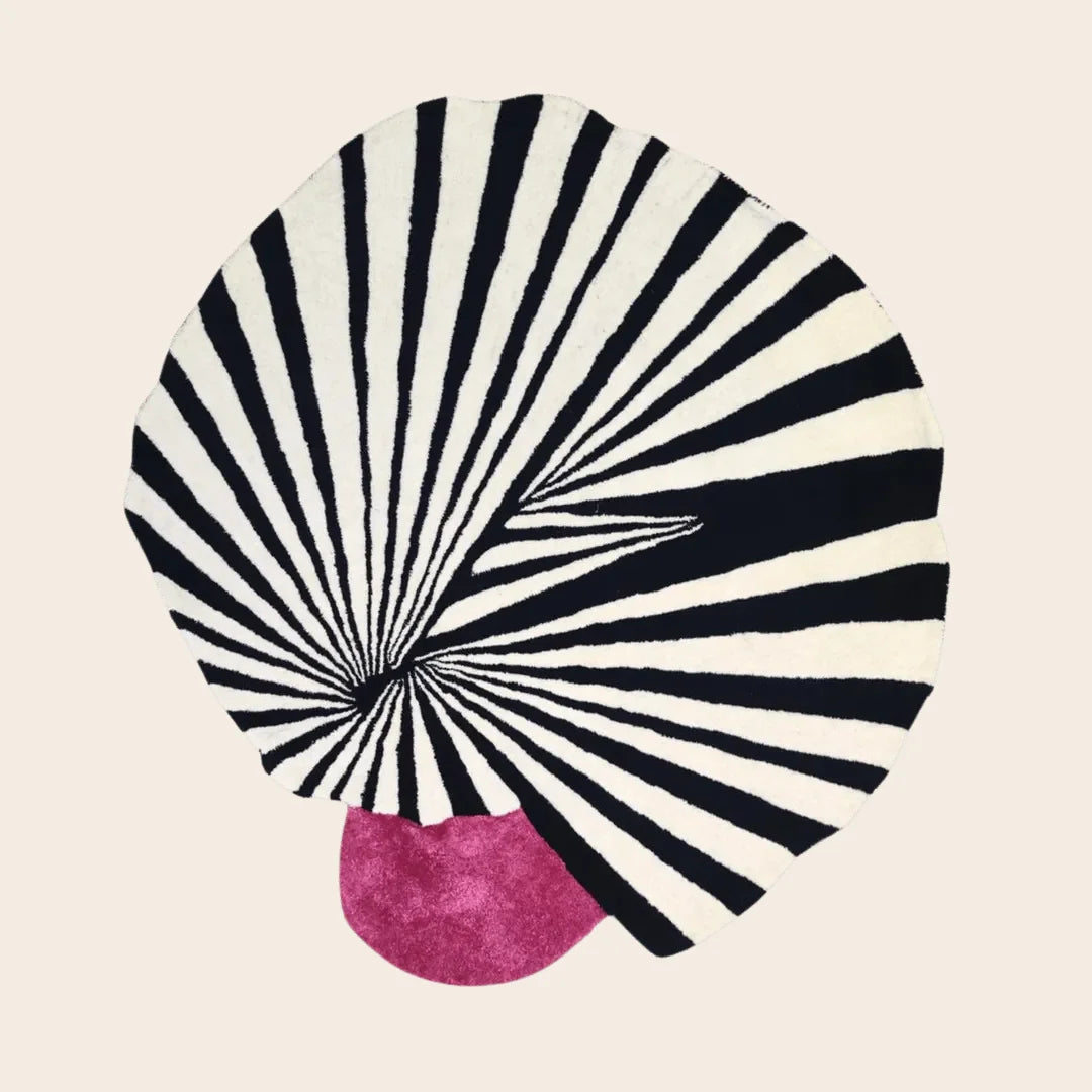 Step onto the Pink Sun Hand Tufted Wool Rug