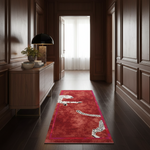 A long red runner rug with a leopard print design is displayed on a dark wood floor in a luxurious hallway with dark wood paneling.